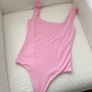 Naked wardrobe pink bodysuit